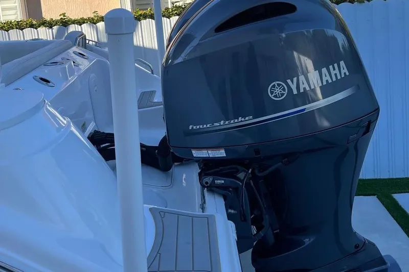 Slide: The Image of 2021 Sea Fox 268 Commander with Yamaha four-stroke outboard motor, docked outdoors. - 15