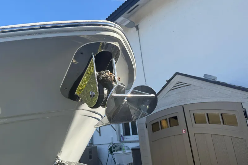 Slide: The Image of 2021 Sea Fox 268 Commander boat anchor detail with a clear blue sky background. - 17