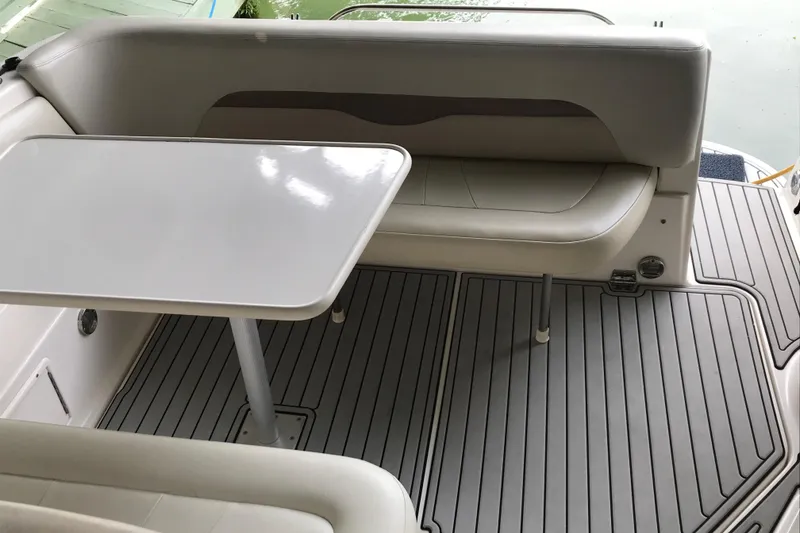 Slide: The Image of 2005 Chaparral 270 Signature boat interior with seating and table. - 18