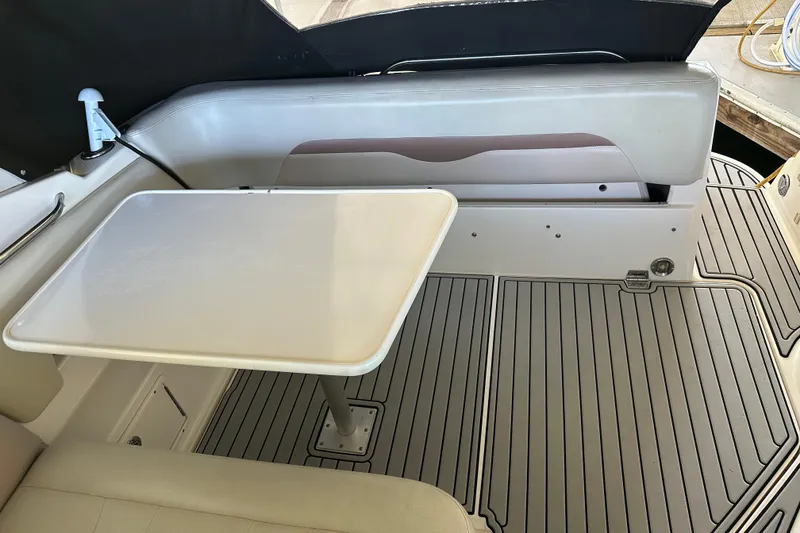 Slide: The Image of 2005 Chaparral 270 Signature boat interior with table and seating area. - 20