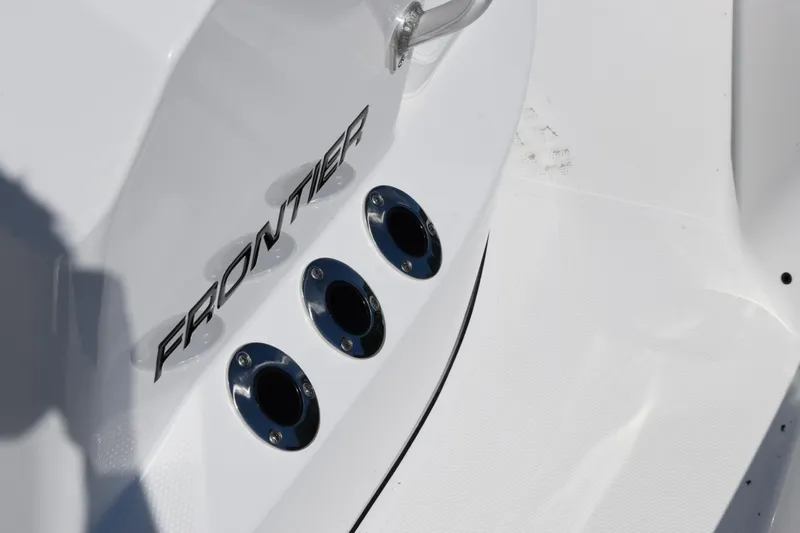 Slide: The Image of 2026 Frontier 180 boat detail with chrome fittings and sleek white design. - 18