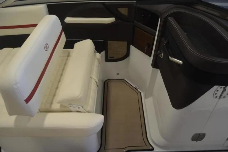 Slide: The Image of 2018 Cobalt R5 Surf boat interior with white seating and red accents. - 11