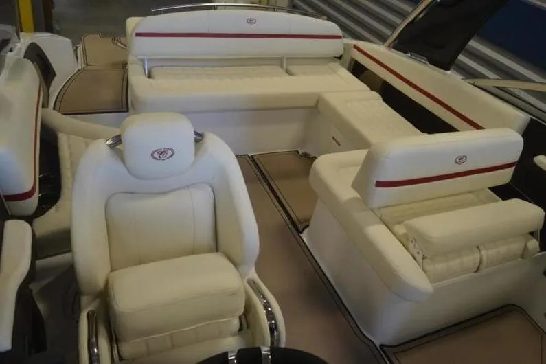 Slide: The Image of 2018 Cobalt R5 Surf boat interior with luxurious white seating and red accents. - 12