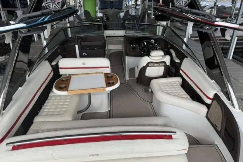 Slide: The Image of 2018 Cobalt R5 Surf boat interior with luxurious seating and sleek design. - 18