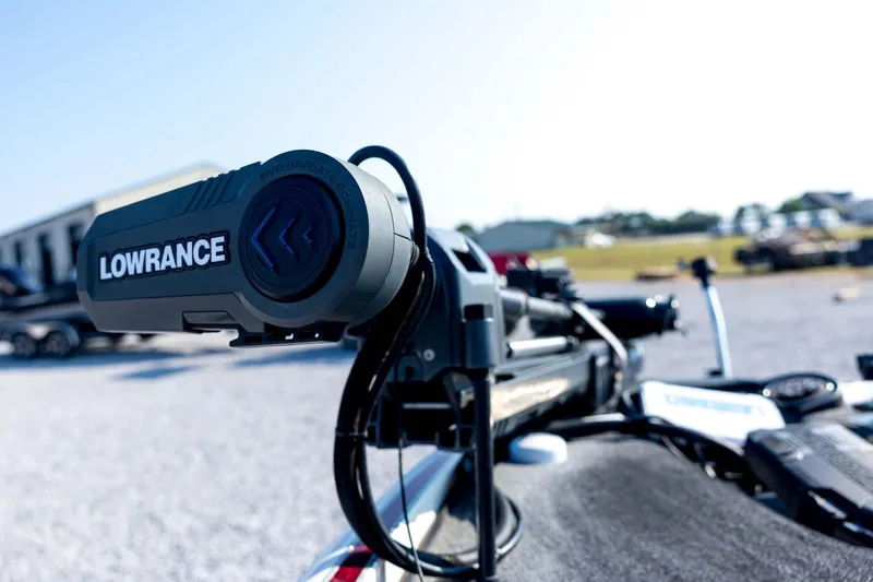 Slide: The Image of Triton 20XS DC 2011 boat with Lowrance navigation system in focus. - 29