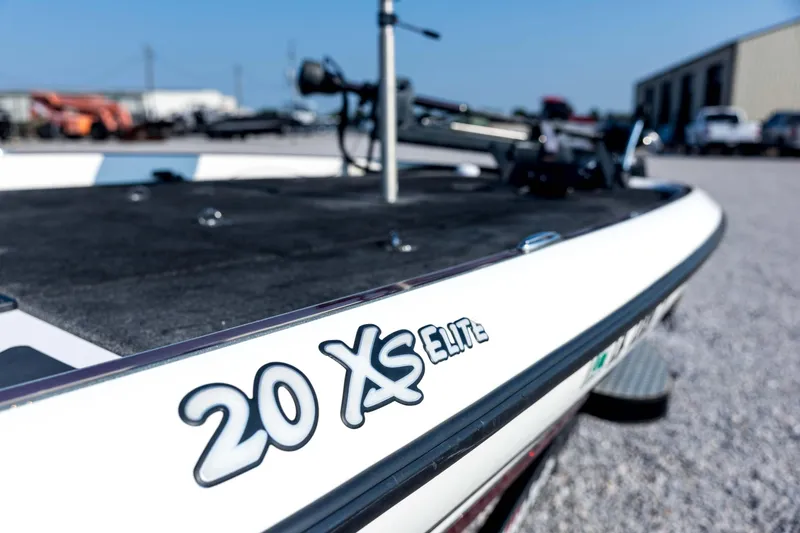 Slide: The Image of 2011 Triton 20XS DC boat, close-up of "20 XS Elite" logo on deck. - 32
