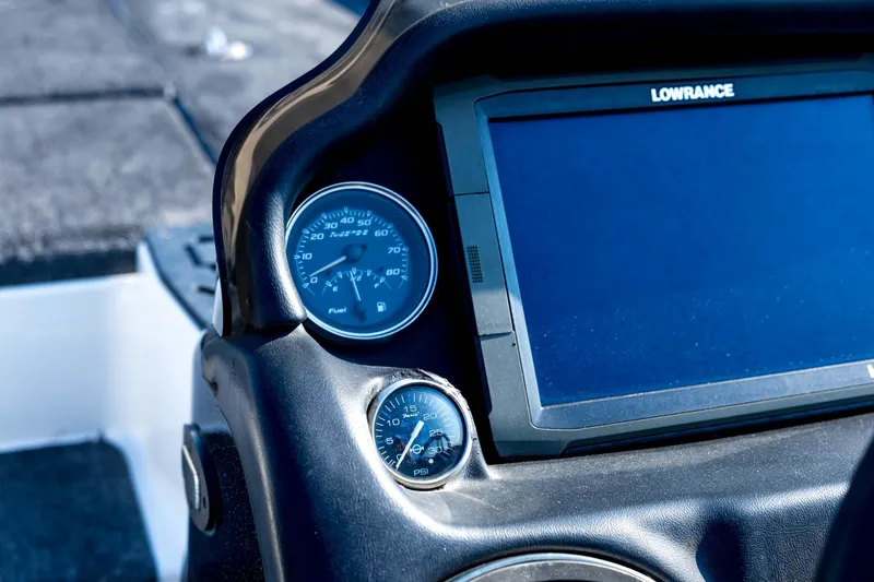 Slide: The Image of Dashboard of a 2011 Triton 20XS DC boat with Lowrance display and gauges. - 50
