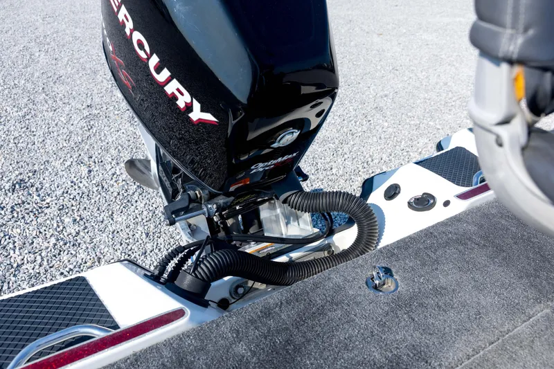 Slide: The Image of 2011 Triton 20XS DC boat with Mercury engine, detailed view of motor and deck. - 70