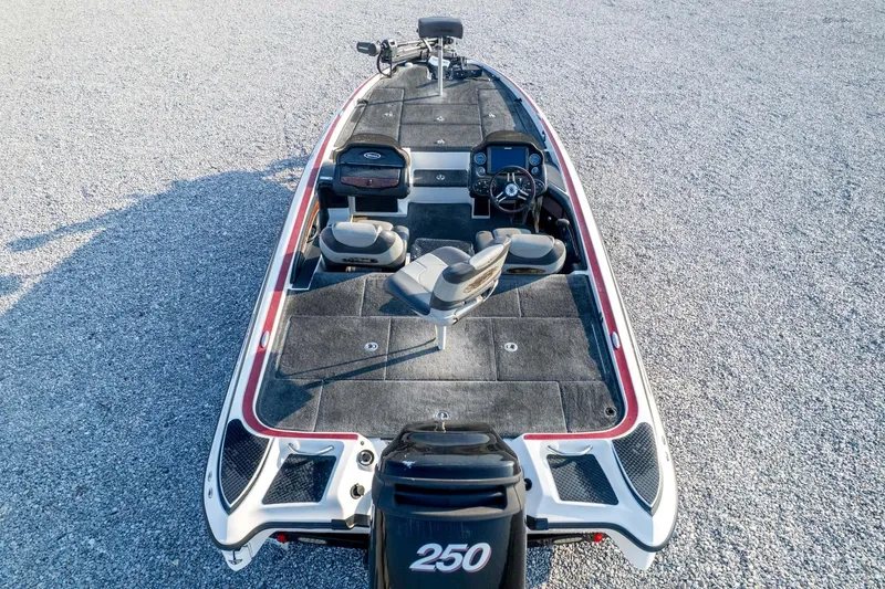 Slide: The Image of 2011 Triton 20XS DC boat with dual consoles and spacious deck, viewed from above. - 82