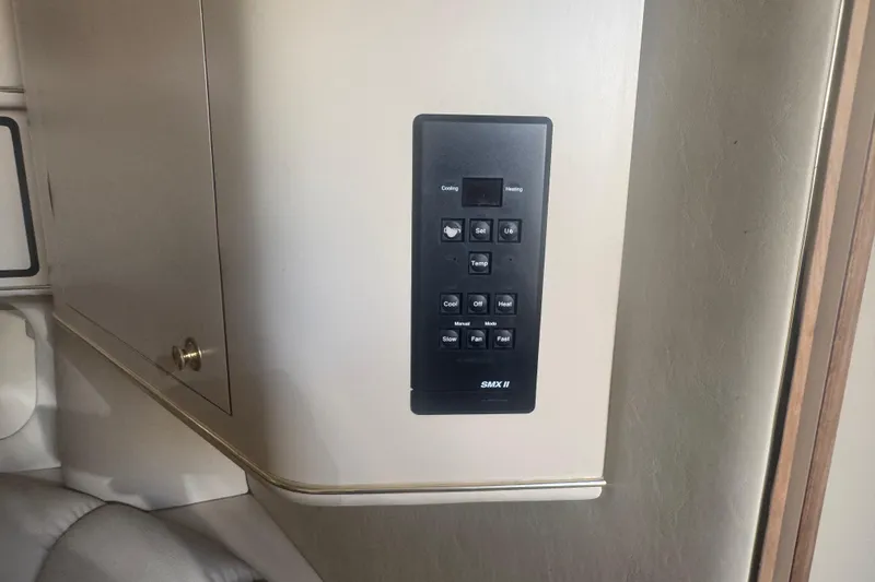 Slide: The Image of Control panel on 1999 Sea Ray Sundancer 400 yacht interior. - 26