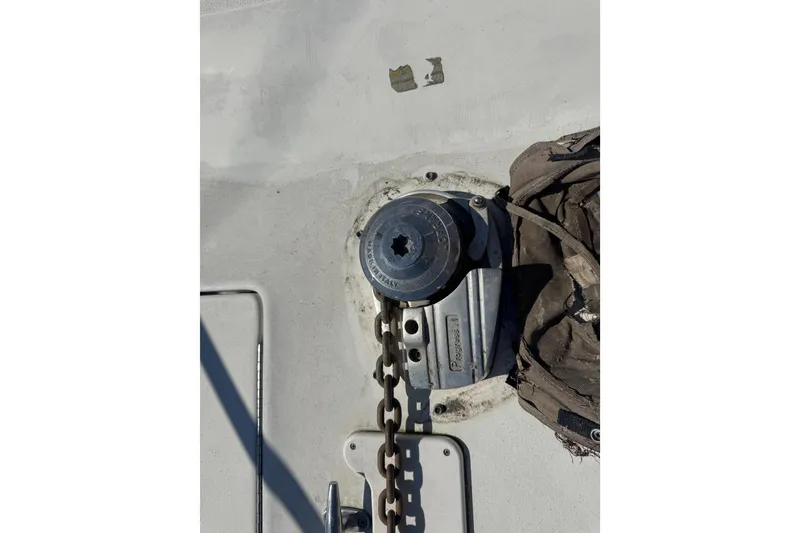 Slide: The Image of Anchor windlass on 1999 Sea Ray Sundancer 400 boat deck. - 41