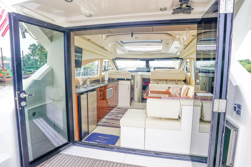 Slide: The Image of Tri-fold glass doors connecting exterior with interior - 2