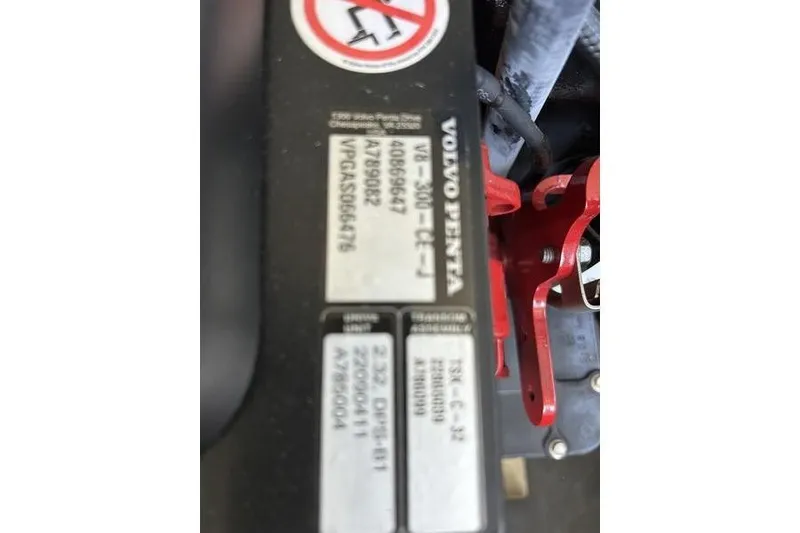 Slide: The Image of Close-up of a Volvo Penta engine label on a 2017 Cobalt R30 boat. - 18