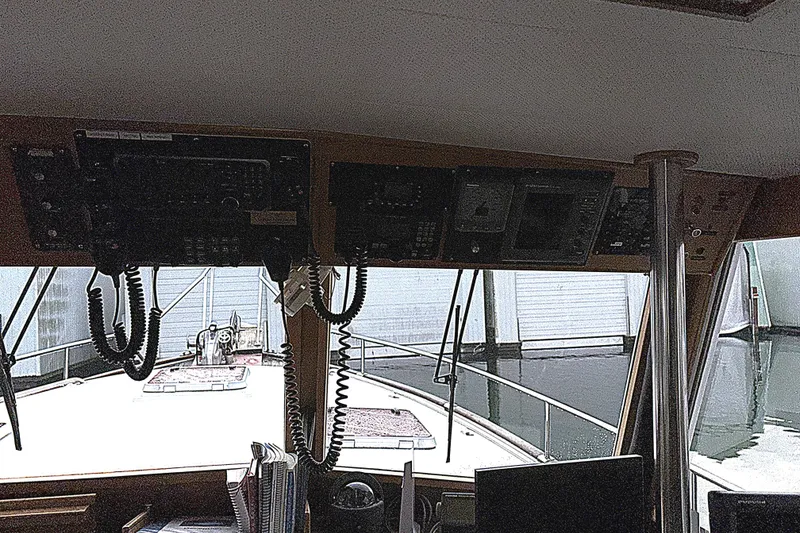 Slide: The Image of Interior view of 1984 Grand Banks Classic boat cockpit with navigation equipment. - 33