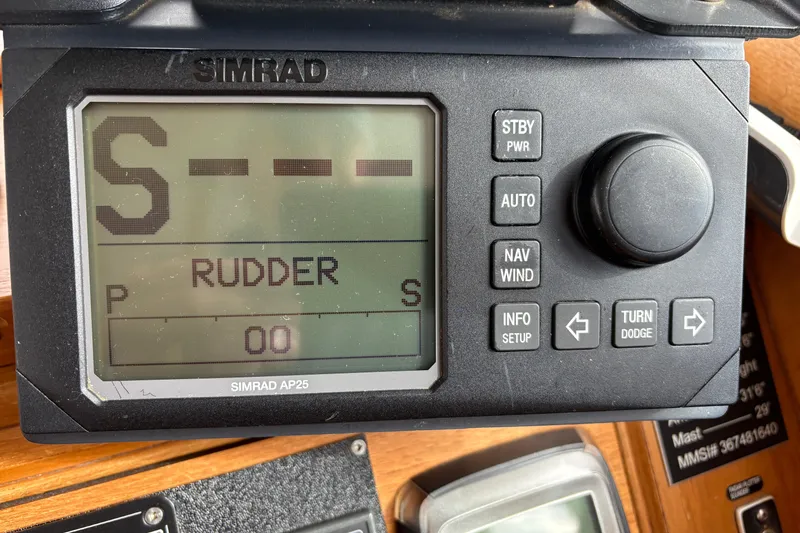 Slide: The Image of Simrad AP25 autopilot display on 1984 Grand Banks Classic boat. - 41