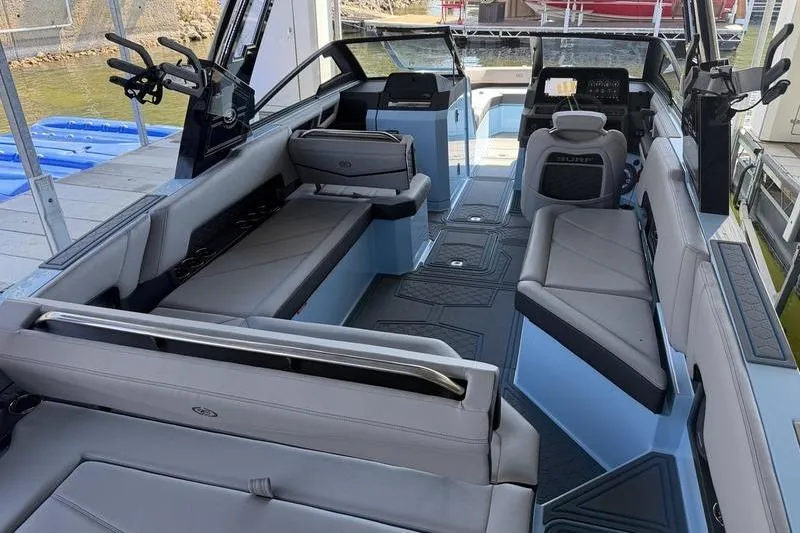 Slide: The Image of Dashboard of 2026 Cobalt R8 Surf boat with advanced navigation displays. - 12