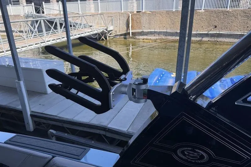 Slide: The Image of 2026 Cobalt R8 Surf boat cockpit with modern steering and digital display. - 7