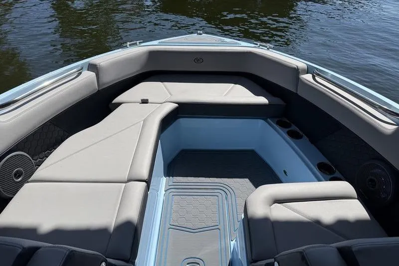 Slide: The Image of 2026 Cobalt R8 Surf boat interior with sleek seating and modern design. - 9