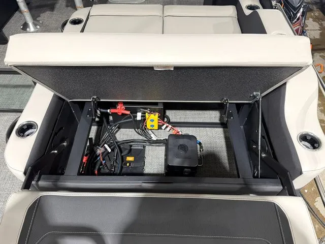 Slide: The Image of Interior view of 2026 Barletta Cabrio 24UE 3T with open storage compartment. - 17