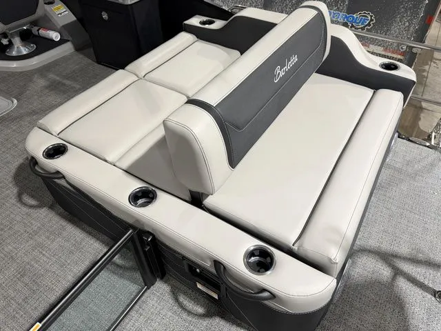 Slide: The Image of Barletta Cabrio 24UE 3T 2026 boat seating with cup holders. - 18