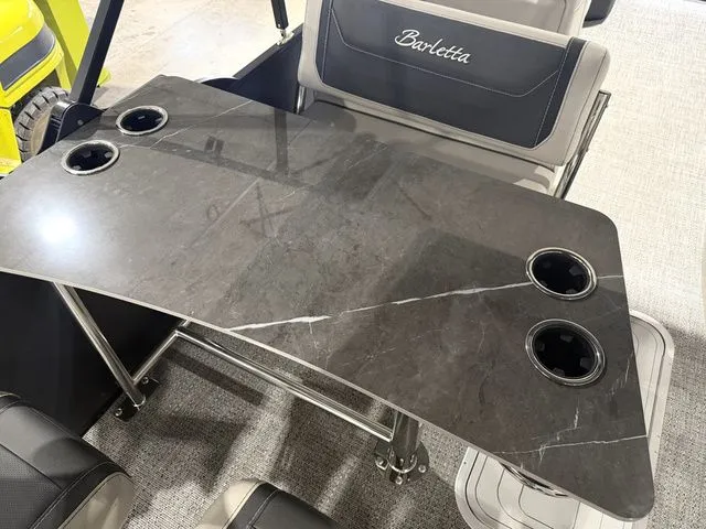 Slide: The Image of Barletta Cabrio 24UE 3T 2026 table with cup holders. - 25