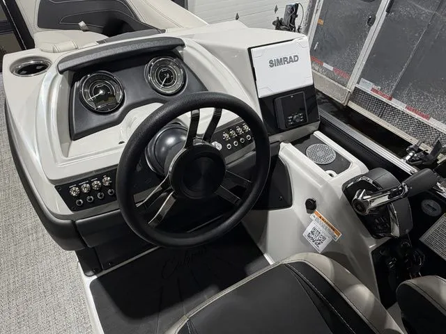 Slide: The Image of Interior of 2026 Barletta Cabrio 24UE 3T with steering console. - 32