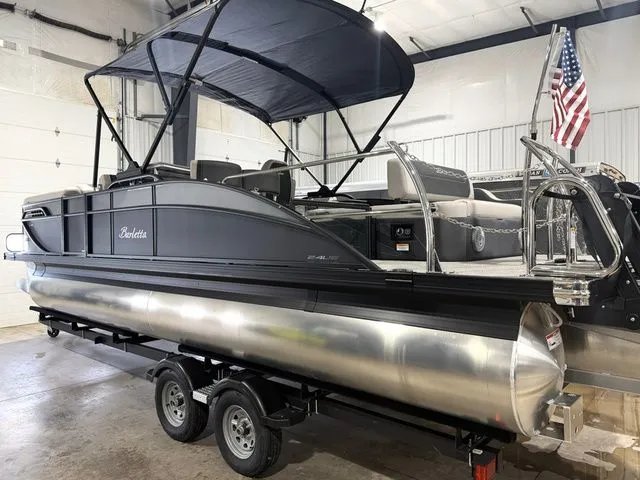 Slide: The Image of Barletta Cabrio 24UE 3T 2026 pontoon boat in warehouse. - 8