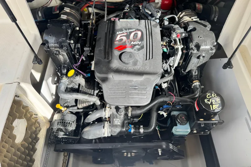 Slide: The Image of Engine of a 2008 Sea Ray 200 Sundeck boat, featuring a MerCruiser 5.0 MPI. - 20
