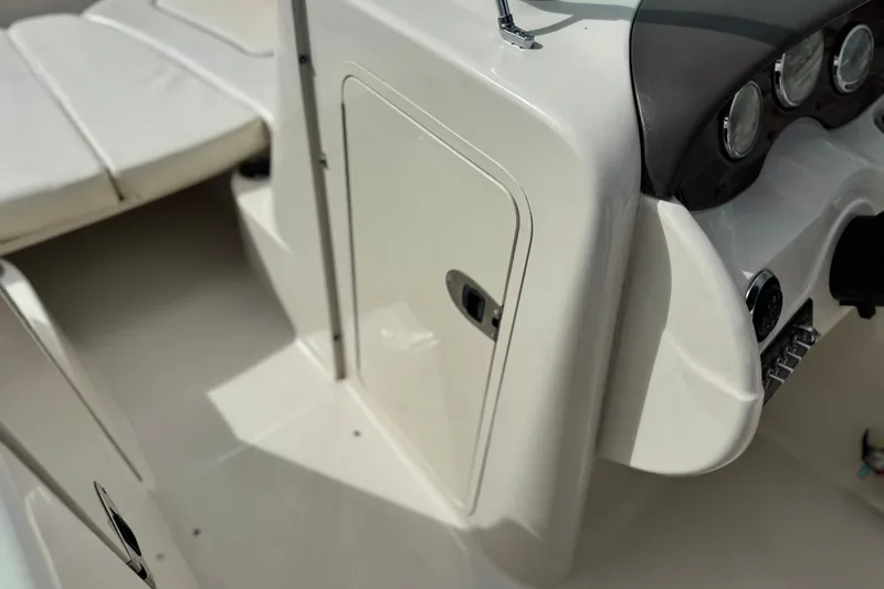 Slide: The Image of 2008 Sea Ray 200 Sundeck interior, featuring dashboard and seating area. - 28