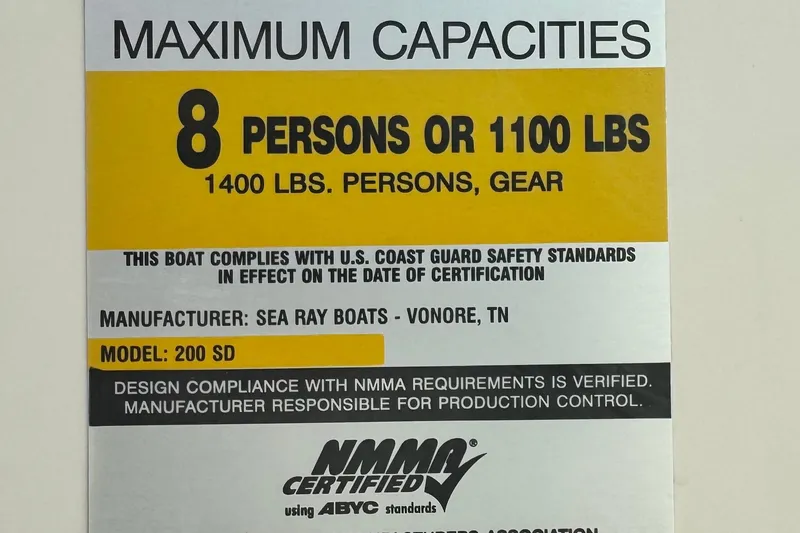 Slide: The Image of 2008 Sea Ray 200 Sundeck capacity label, 8 persons or 1100 lbs, NMMA certified. - 33