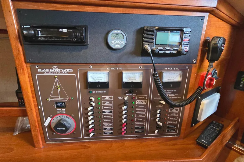 Slide: The Image of Control panel of a 1989 Island Packet 38 yacht with navigation and communication equipment. - 9