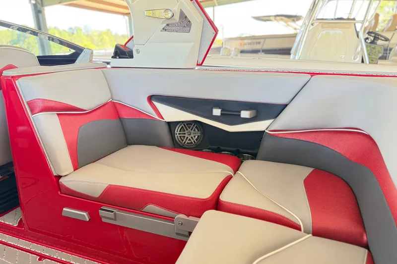 Slide: The Image of Red and gray interior seating of 2017 Supra SA450 boat. - 14