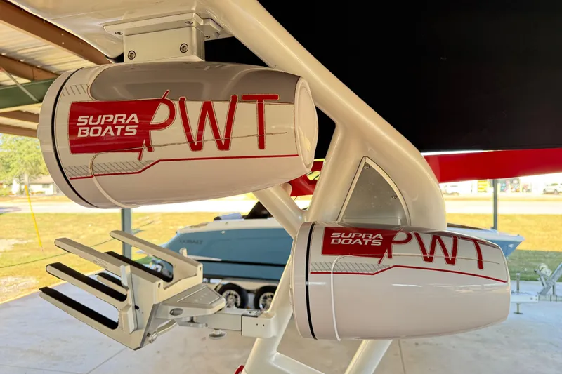 Slide: The Image of 2017 Supra SA450 boat speakers with "PWT" branding in a covered area. - 24
