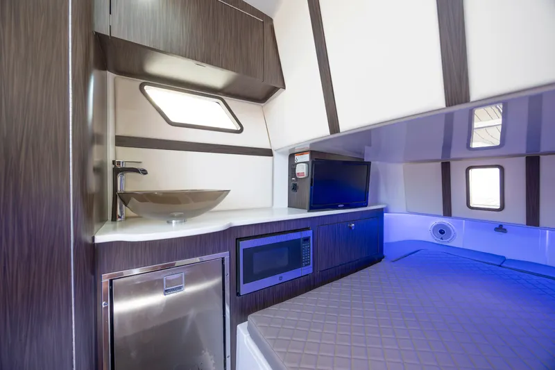 Slide: The Image of Luxurious interior of 2021 Edgewater 370CC boat with modern amenities and sleek design. - 44