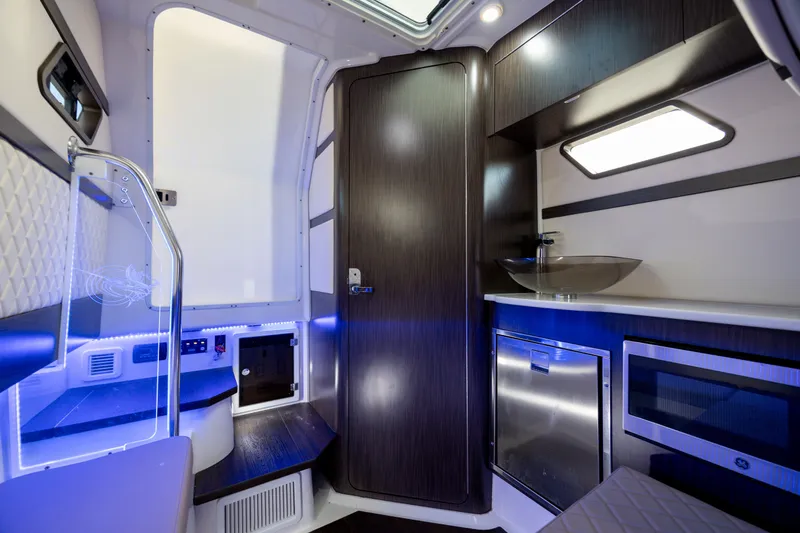 Slide: The Image of Luxurious interior of 2021 Edgewater 370CC boat with modern amenities and sleek design. - 51