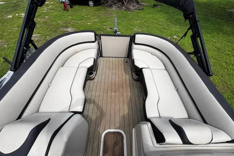 Slide: The Image of 2023 Tahoe Pontoon Cascade Platinum Quad Lounger interior with spacious seating and elegant design. - 13
