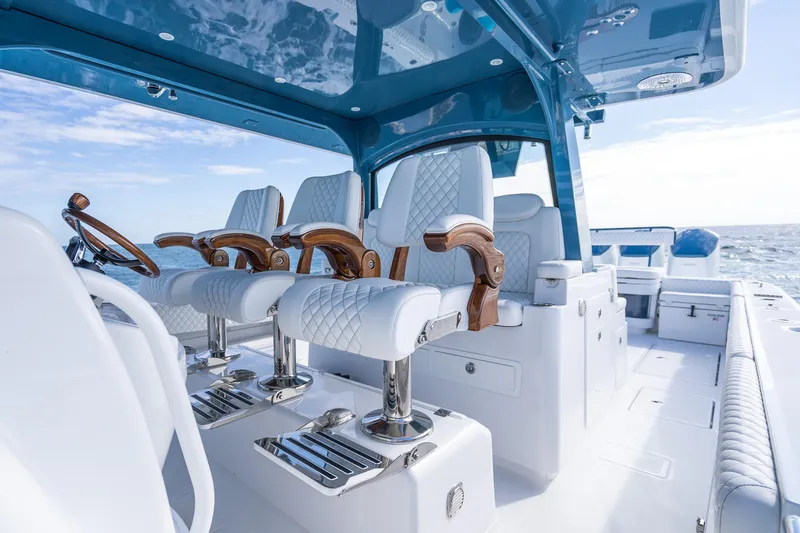 Slide: The Image of Luxurious interior of 2026 HCB 53 Suenos RXV boat with elegant seating and ocean view. - 20