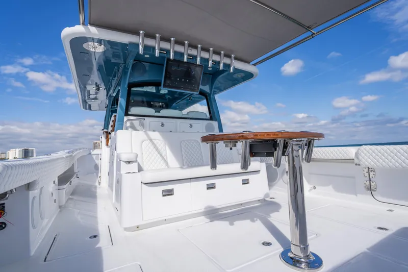 Slide: The Image of 2026 HCB 53 Suenos RXV luxury boat interior with sleek seating and modern amenities. - 28