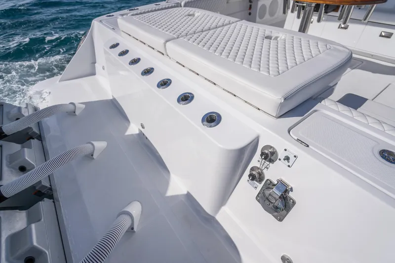 Slide: The Image of Luxury deck of 2026 HCB 53 Suenos RXV boat with quilted seating. - 44