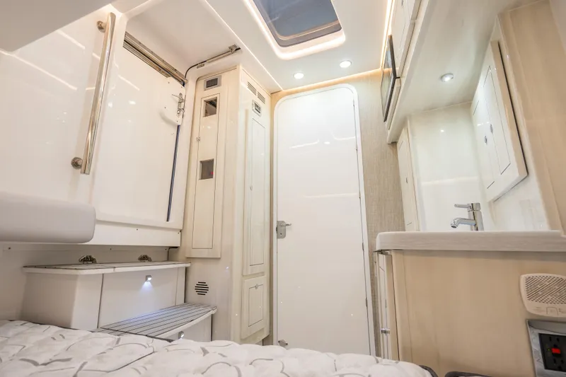 Slide: The Image of Luxurious interior of 2026 HCB 53 Suenos RXV boat with modern amenities. - 7