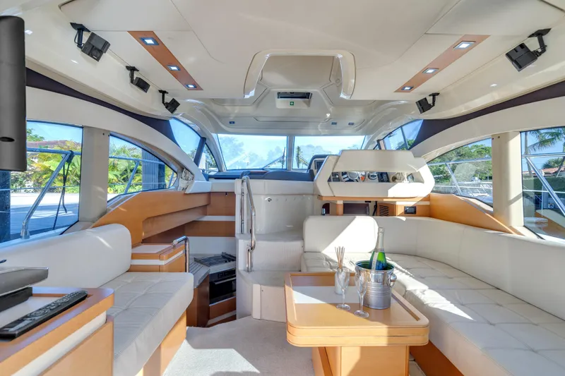 Slide: The Image of Luxurious interior of 2013 Azimut 45 Flybridge yacht with elegant seating and panoramic windows. - 18
