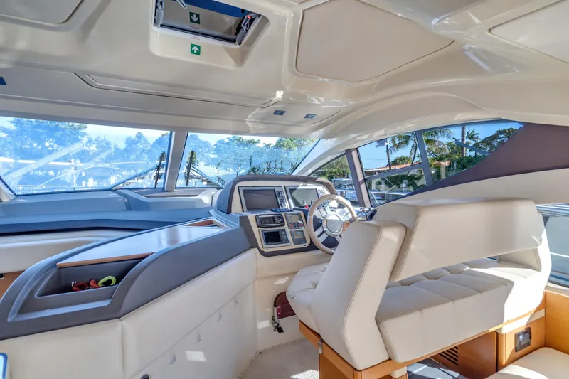Slide: The Image of Interior of 2013 Azimut 45 Flybridge yacht with modern helm and luxurious seating. - 19