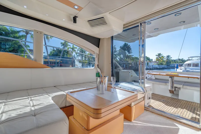 Slide: The Image of Luxurious interior of 2013 Azimut 45 Flybridge yacht with elegant seating and outdoor view. - 20