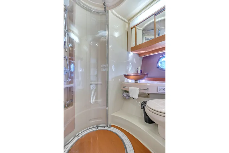 Slide: The Image of Luxurious bathroom in 2013 Azimut 45 Flybridge yacht with modern fixtures and elegant design. - 25