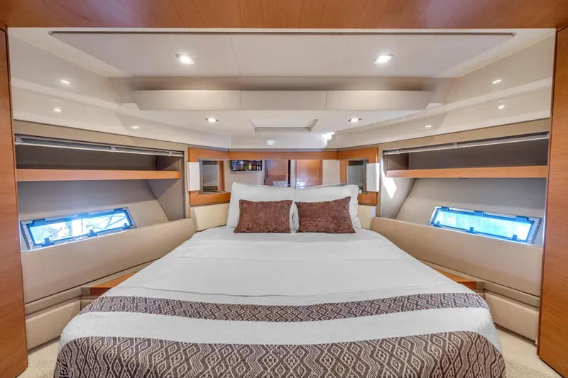 Slide: The Image of Luxurious bedroom interior of 2013 Azimut 45 Flybridge yacht with elegant bedding. - 27