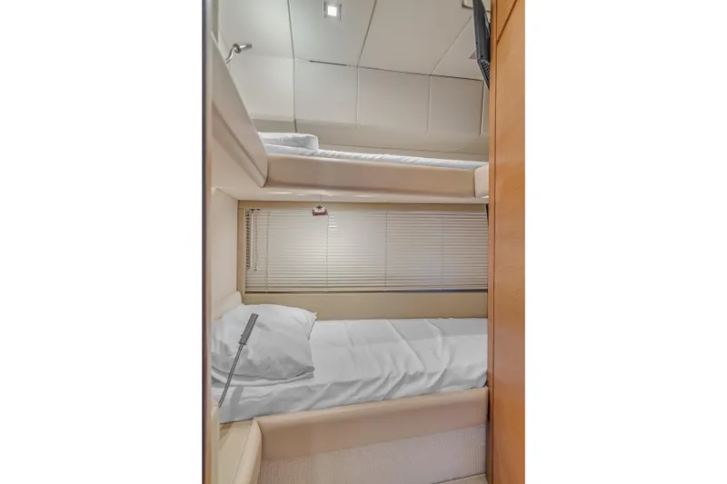 Slide: The Image of 2013 Azimut 45 Flybridge yacht interior with cozy bunk beds and modern design. - 31