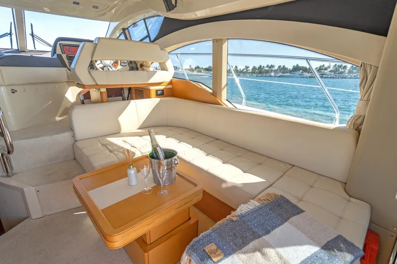 Slide: The Image of Luxurious interior of 2013 Azimut 45 Flybridge yacht with ocean view and elegant seating. - 32