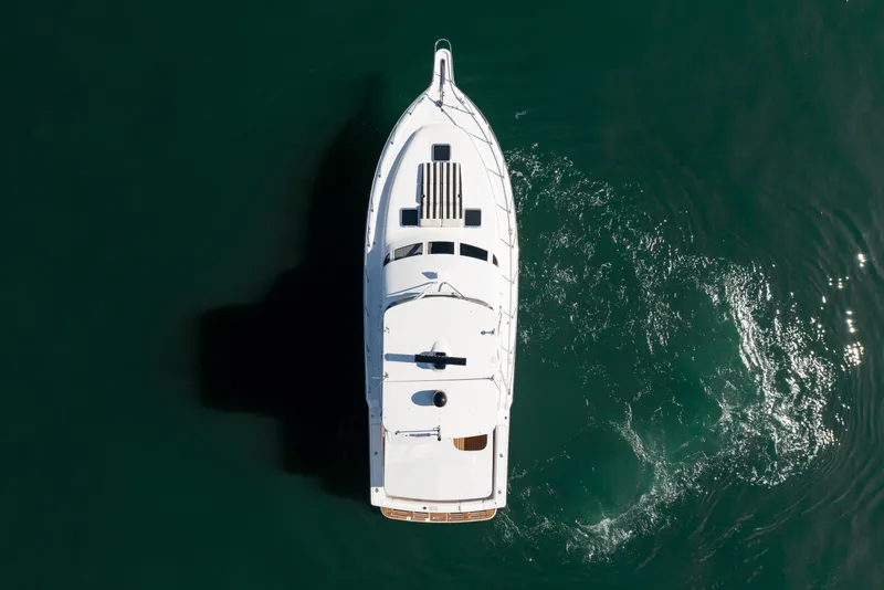 Slide: The Image of Aerial view of 2000 Tiara Yachts 4300 Convertible on calm water. - 41