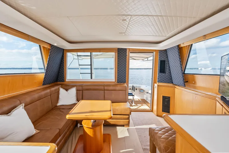 Slide: The Image of Luxurious interior of 2000 Tiara Yachts 4300 Convertible with leather seating and ocean view. - 52