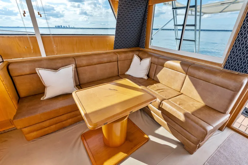 Slide: The Image of Luxurious interior of 2000 Tiara Yachts 4300 Convertible with leather seating and ocean view. - 53